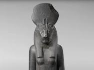 statue standing with lion for a head