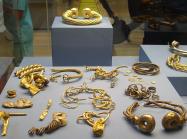 The Snettisham Hoard on display at the British Museum. The hoard contains hundreds of pieces of gold and other metal objects including about 70 intact torcs. License