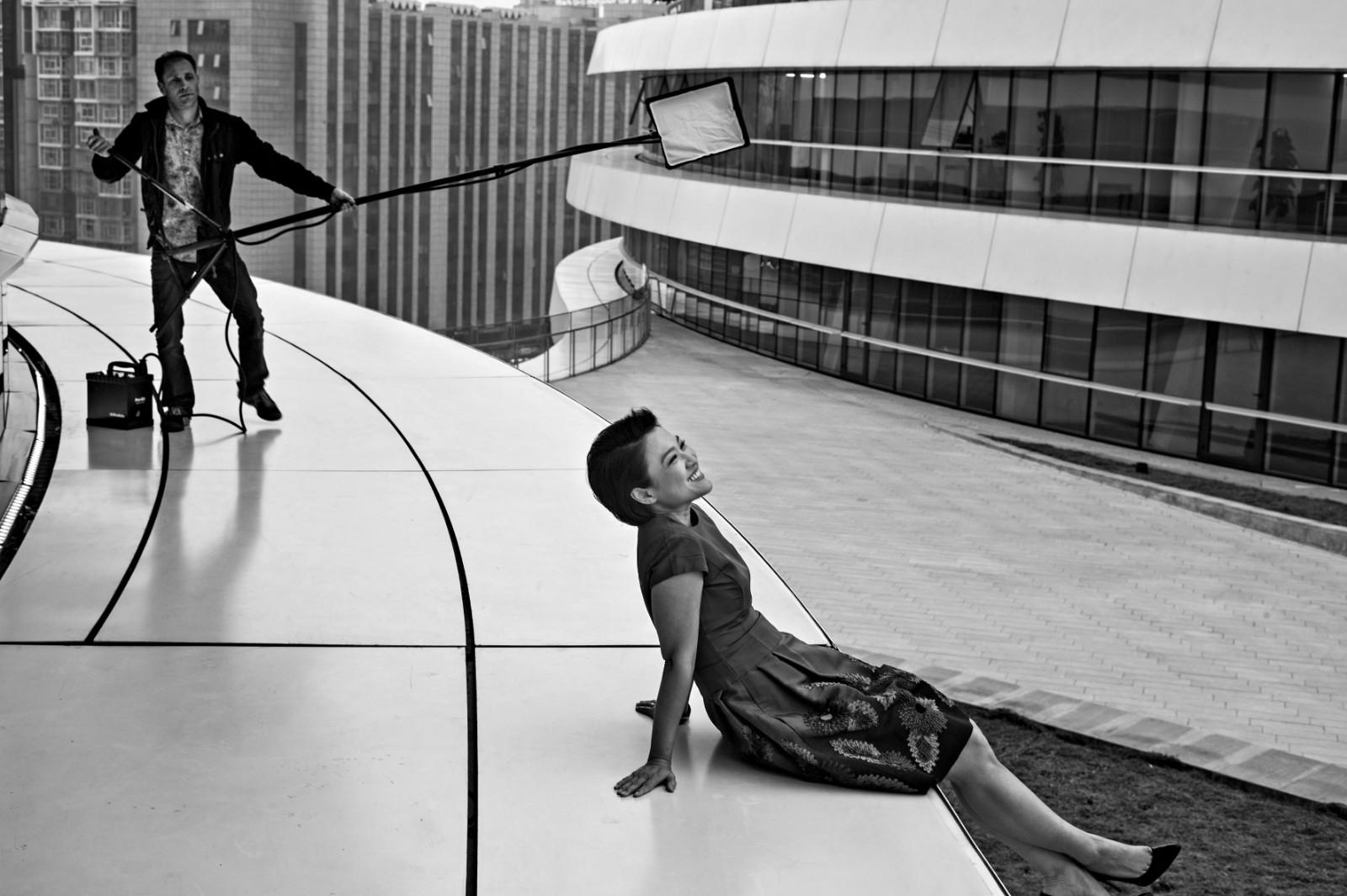 Zhang Xin, CEO of the extraordinarily successful real estate company SOHO China, poses on the roof of her architectural project Galaxy, designed by Zaha Hadid. Beijing 2014.