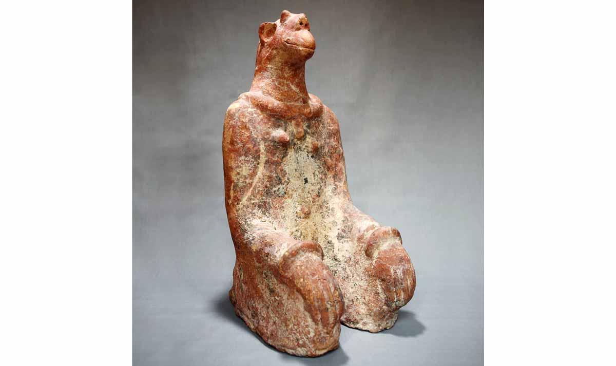Kneeling Figure