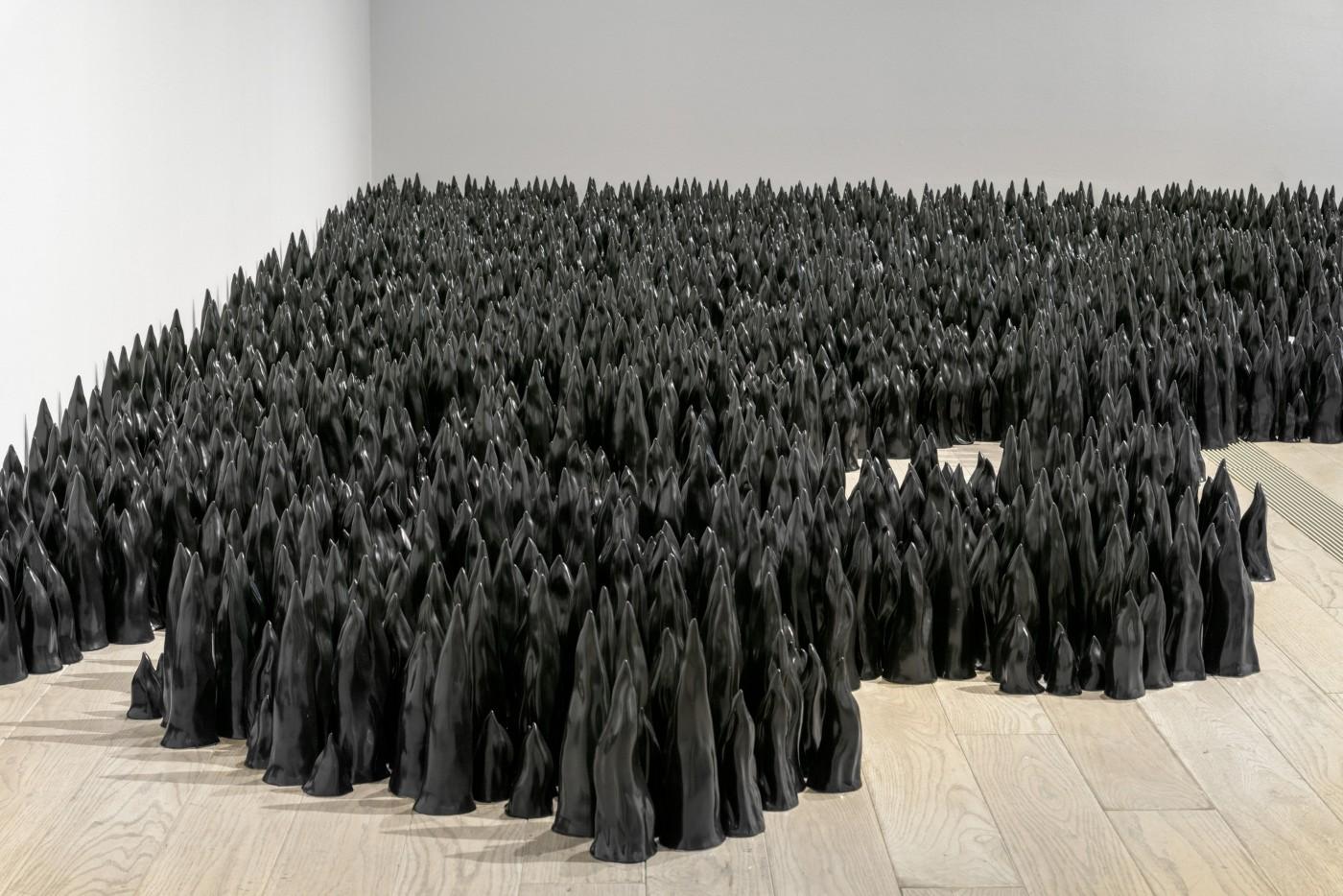 Installation photograph, featuring Liu Jianhua's Black Flame (detail) (2017)