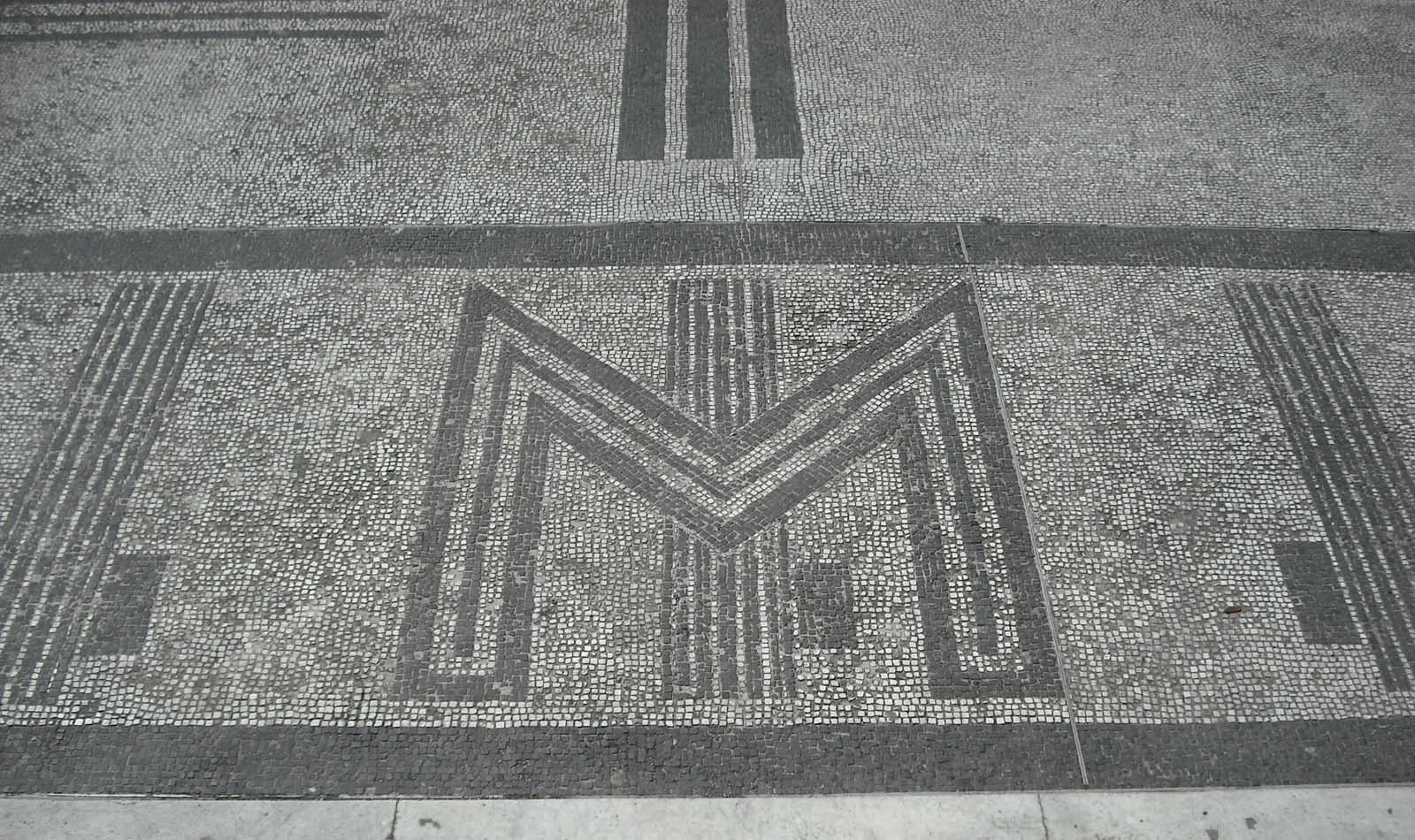 Mosaics at Foro Mussolini. The M, with a fasces through the center, symbolizes Mussolini's name.