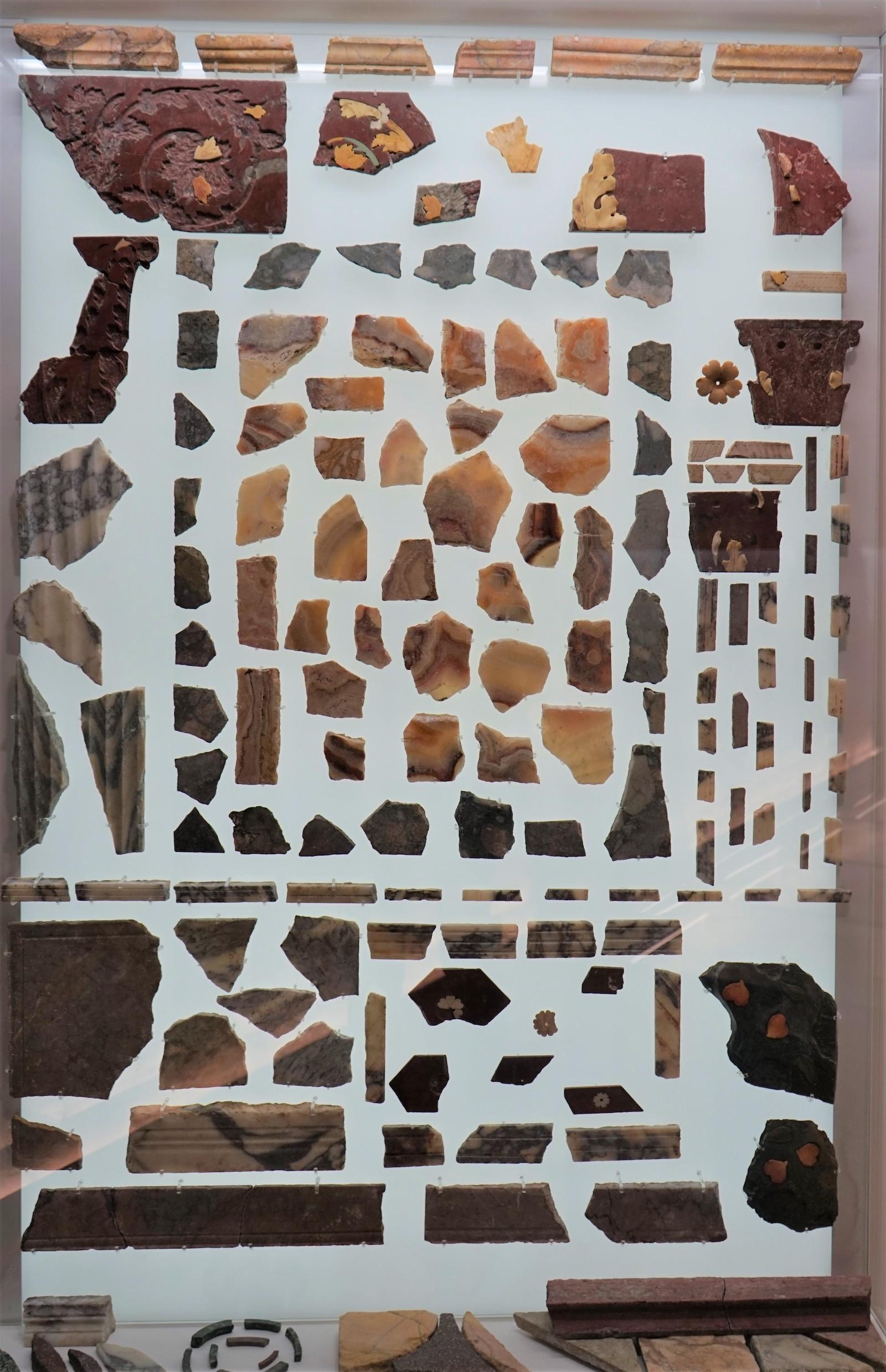 Fragments of coloured marble wall decoration (opus sectile). . Photo by Christopher Siwicki.