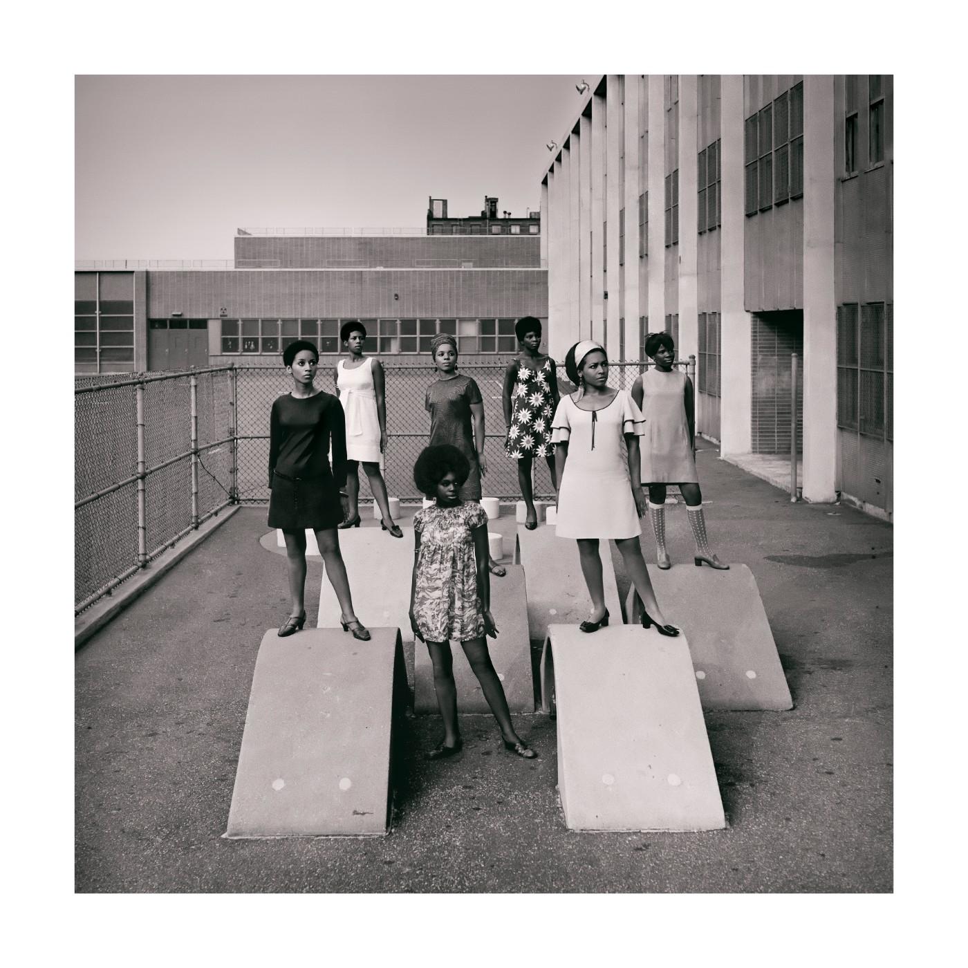 Kwame Brathwaite. Photo shoot at a public school for one of the AJASS-associated modeling groups that emulated the Grandassa Models and began to embrace natural hairstyles. Harlem, ca. 1966.