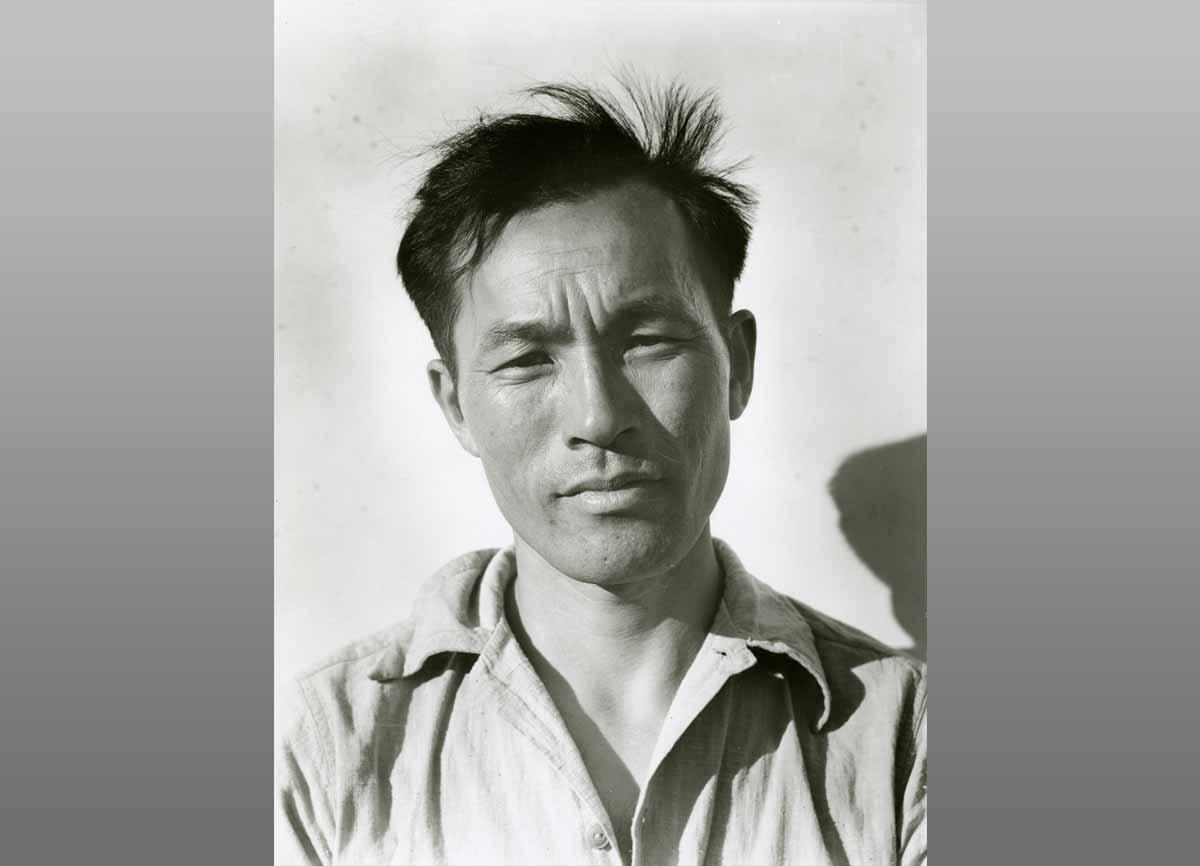 Dorothea Lange. Young Man at Manzanar Relocation Center.