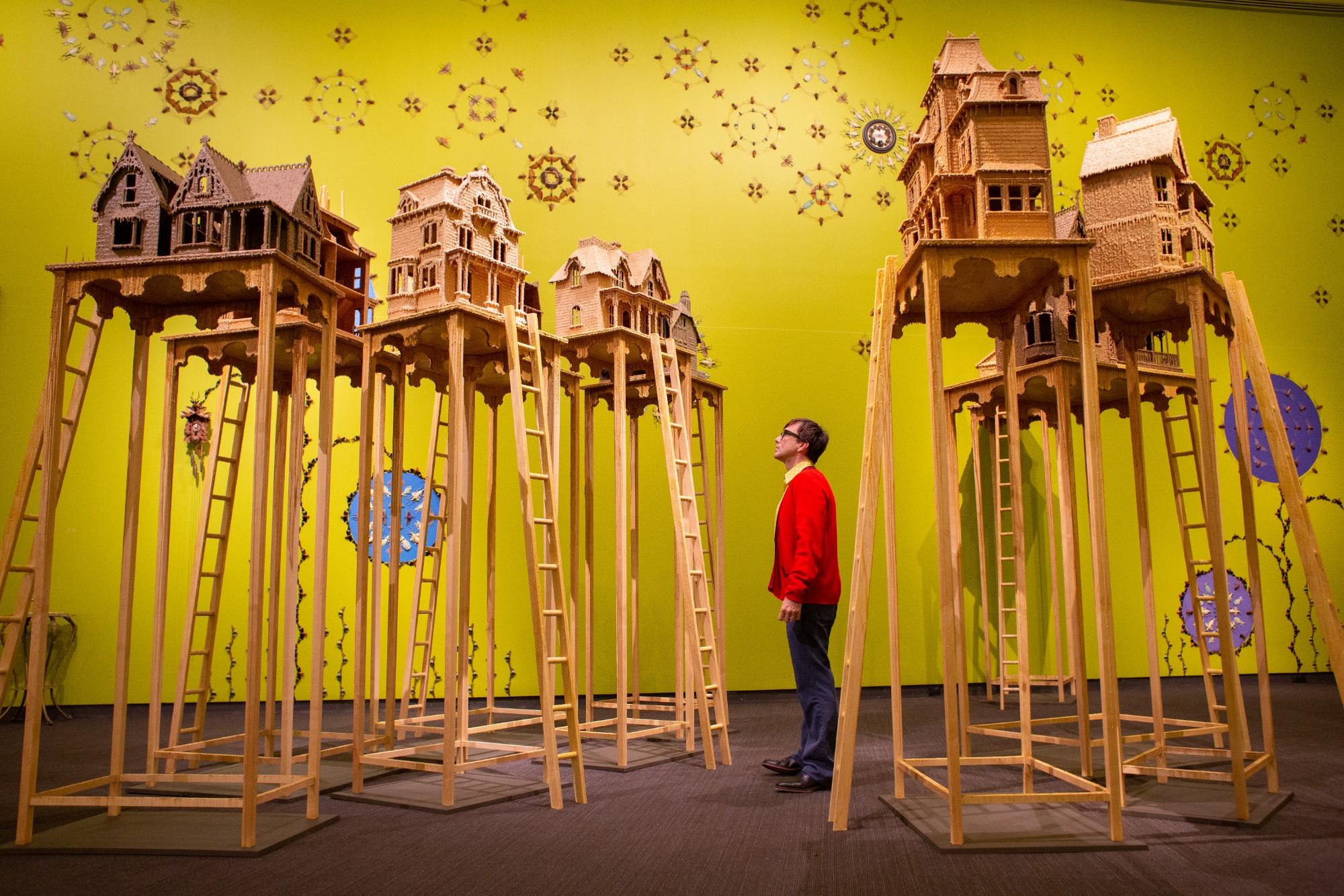 Jennifer Angus installation featuring Victorian dollhouses covered in beeswax.