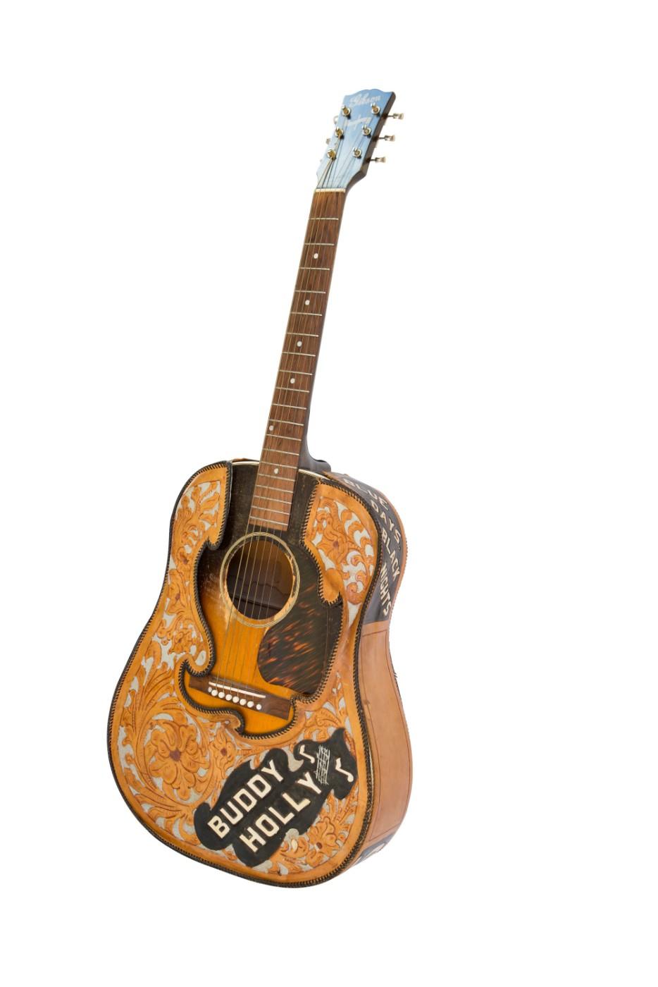 Buddy Holly used this wartime Gibson J-45 to compose many of his hits. Holly was likely inspired to add the hand-tooled leather cover when he saw Elvis with one on the cover of his 1956 debut album.