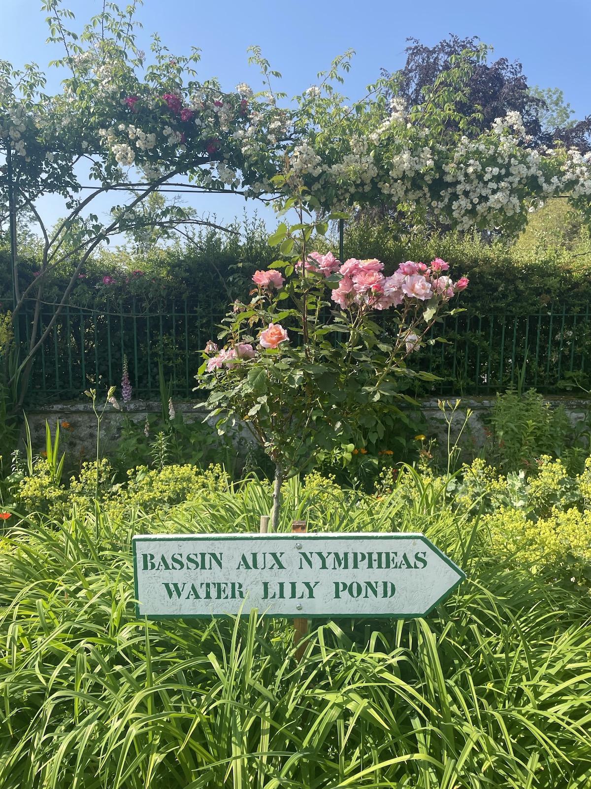 Sign directing visitors to the Water Lily Pond at Monet’s Garden in Giverny.