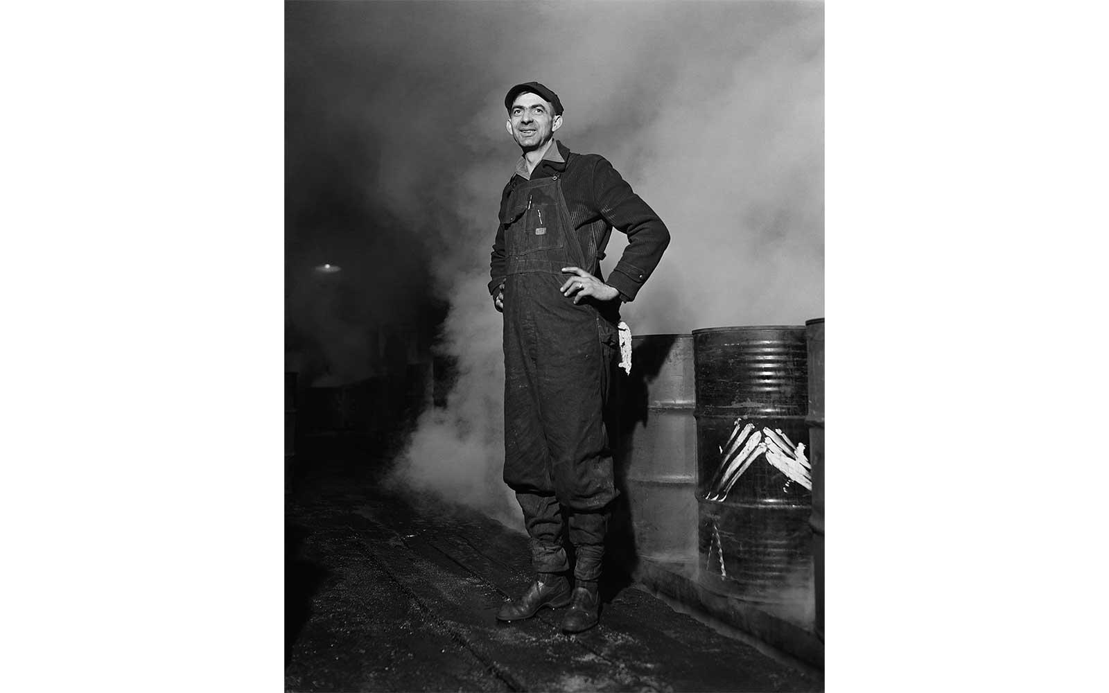 Gordon Parks, A workman at the cooper plant, March 1944.