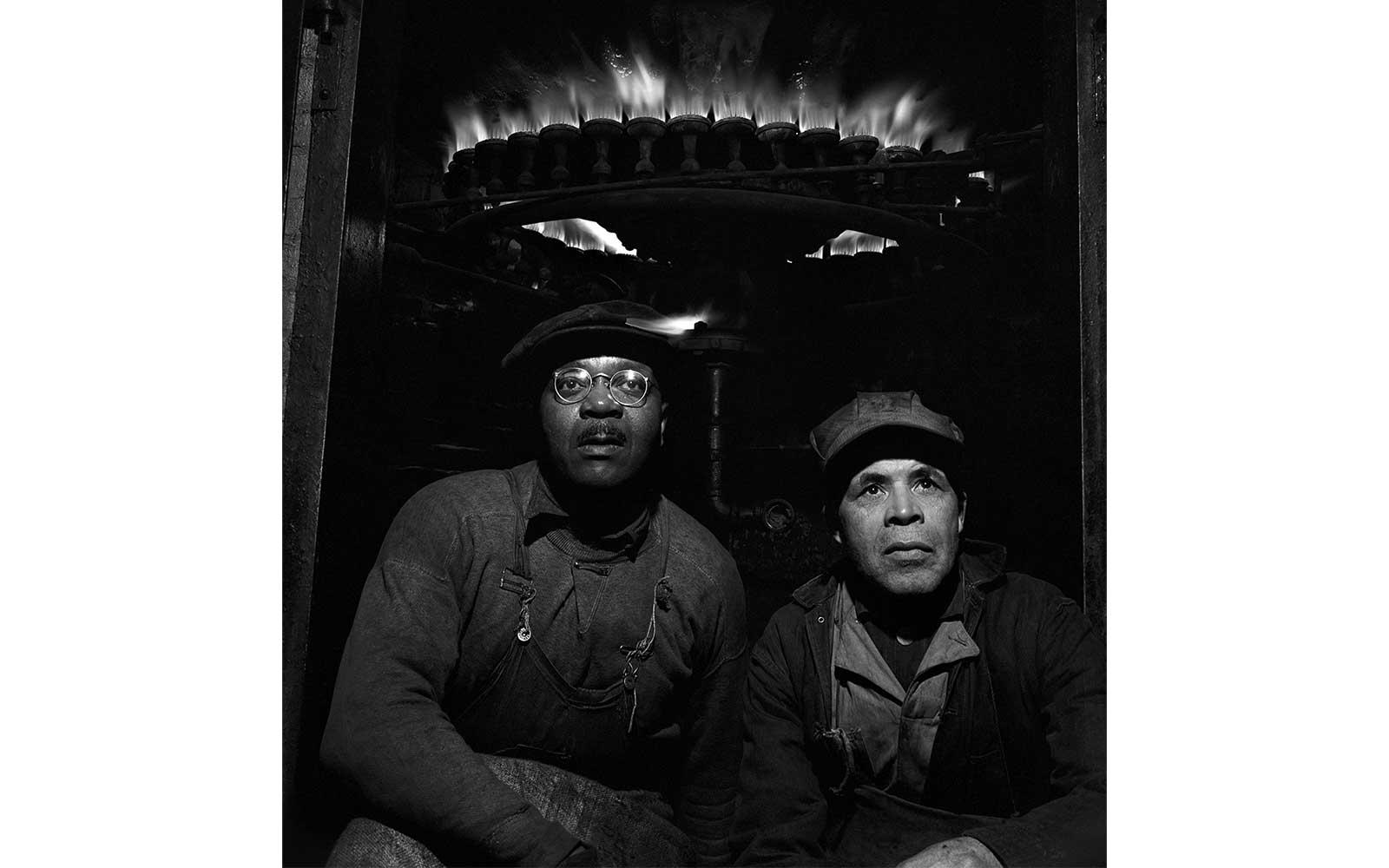 Gordon Parks, The huge three story kettles are heated by gas jets that encircle their bottoms. 450 degrees F. is needed to melt some greases, while some melt at 100 degrees, March 1944.