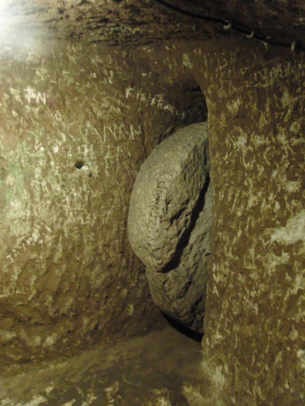 Rolling stone door in the underground town of Derinkuyu, Cappadocia, Turkey