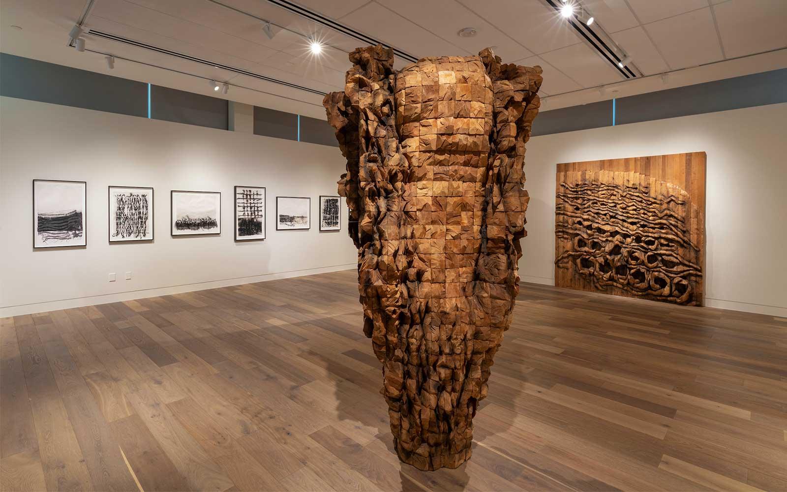 View of Ursula von Rydingsvard works installed in the Denver Botanic Gardens’ gallery space.