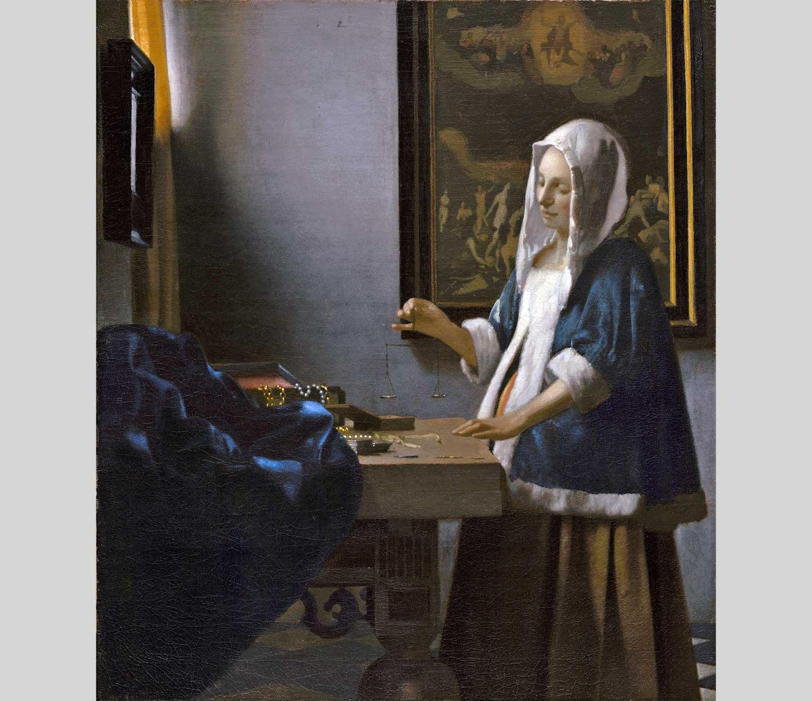 Woman Holding a Balance